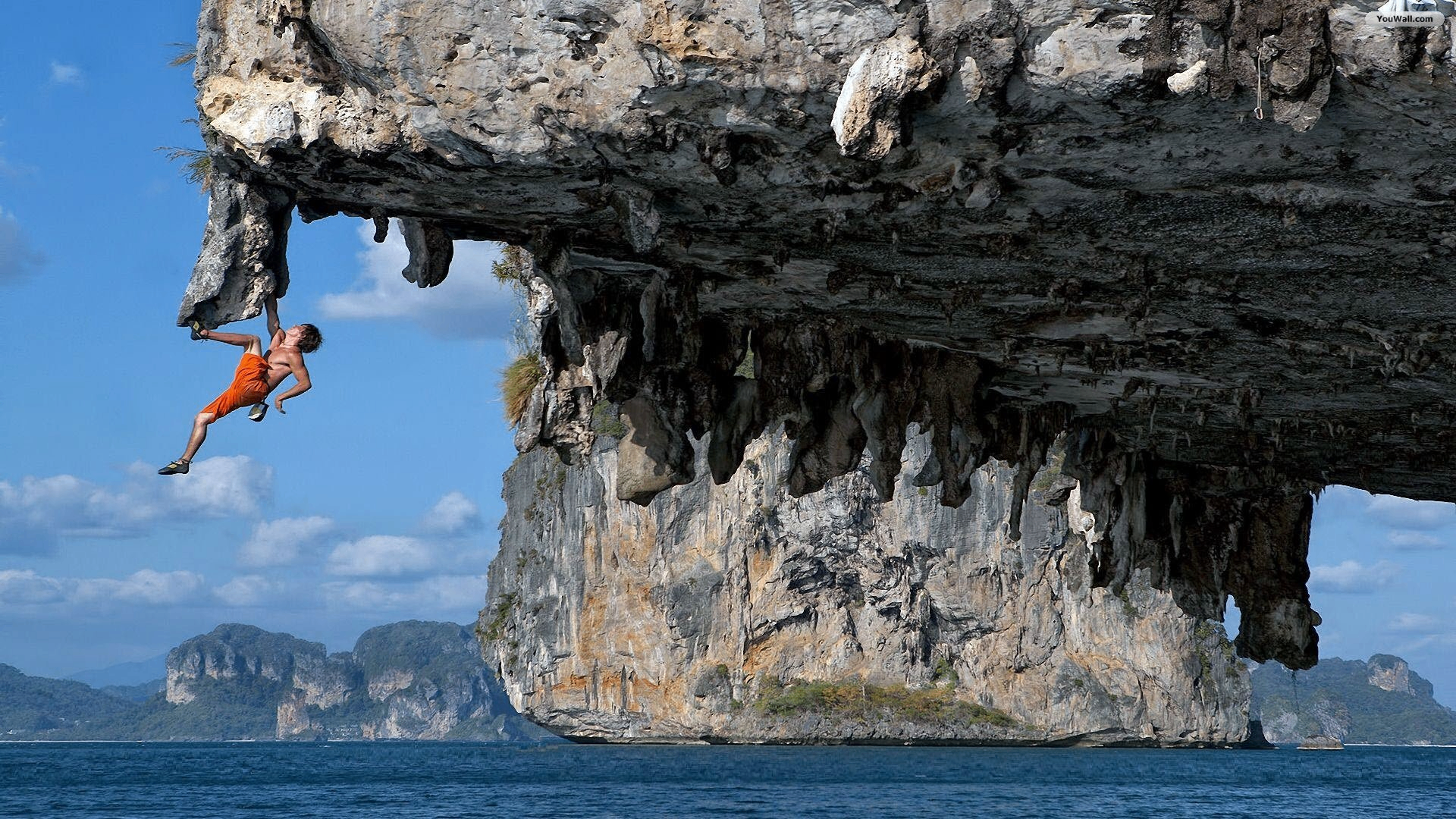 Rock climbing over ocean